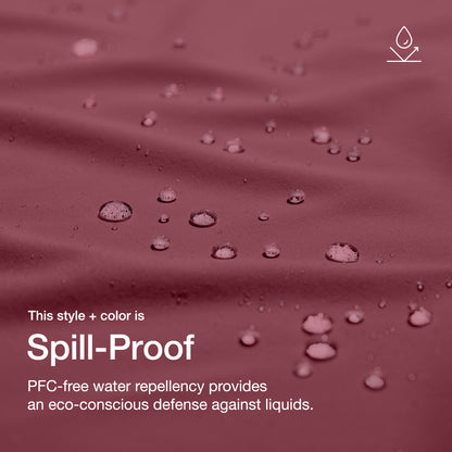 Close up image of fabric with water drops. Image has text: This style+color is Spill-Proof: PFC-free water repllency provides an eco-conscious defenseagains liquids.